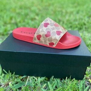 Coach Slides
New with Box!
Women’s